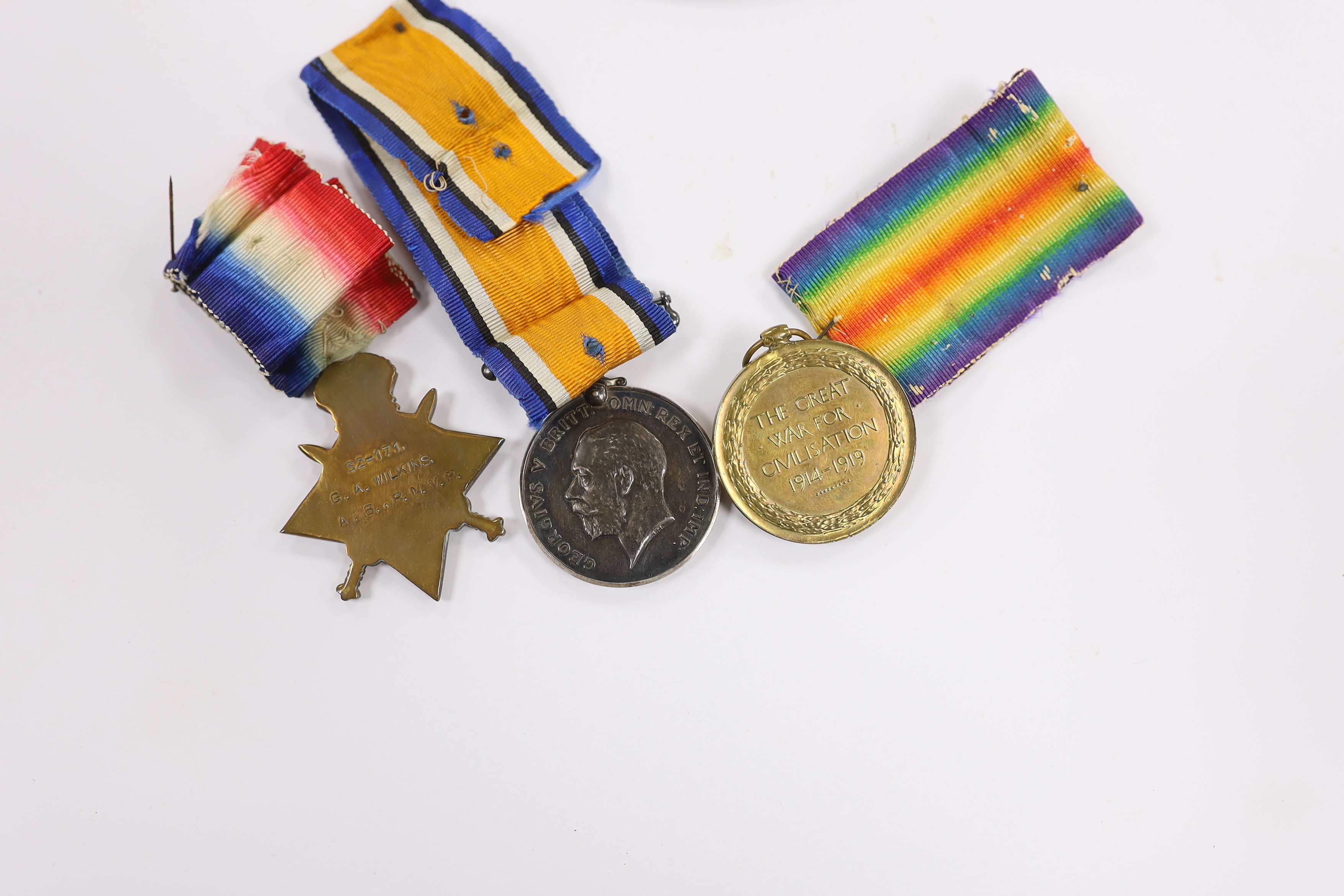 A First World War medal group to G.A. Wilkins A.B. R.N.V.R.; the Victory medal, the War medal and the 1914-15 star, together with the bronze Memorial Plaque in his name